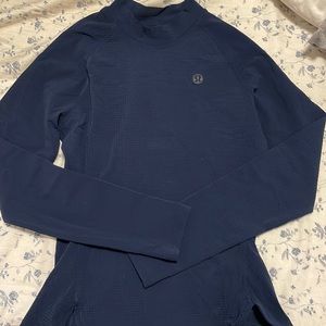 Never worn - lululemon texture grid, higher neck long sleeve, size 2, navy